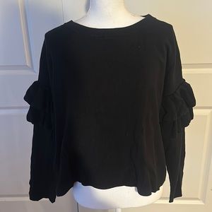 Black sweater with ruffle detail